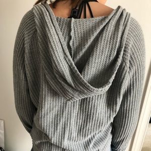 A grey sweater